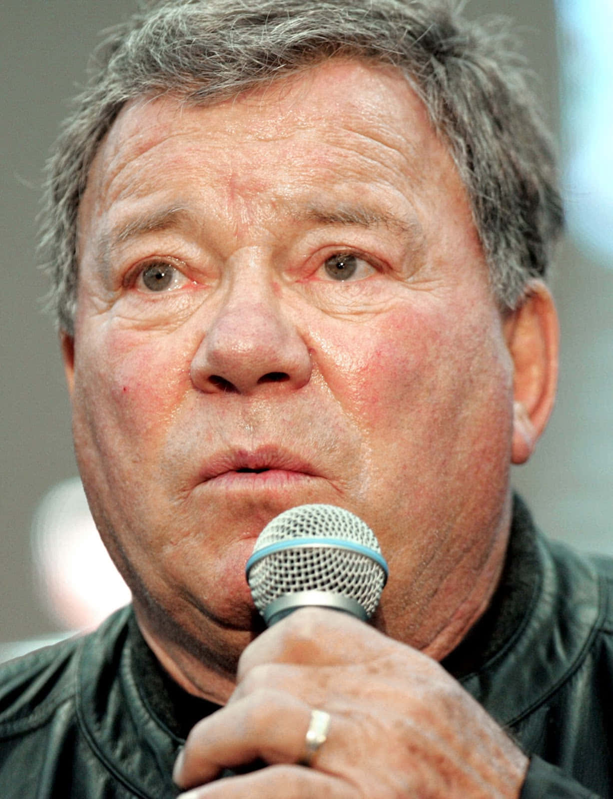 William Shatner Smiling At An Event Background
