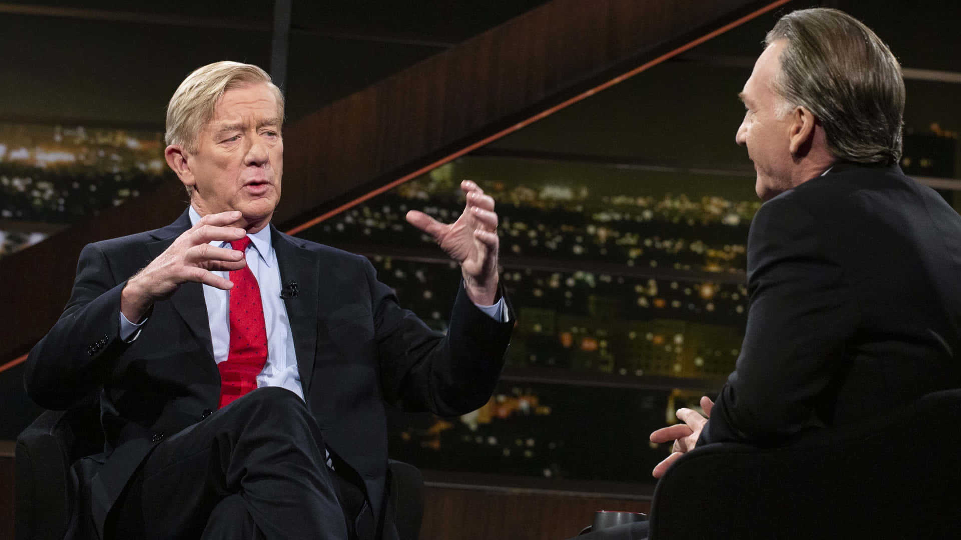 William Weld Against A Background Of City Lights