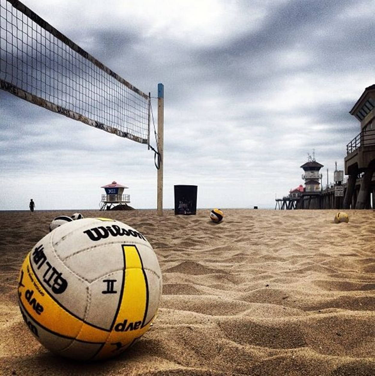 Wilson Beach Volleyball Under Gray Clouds Background