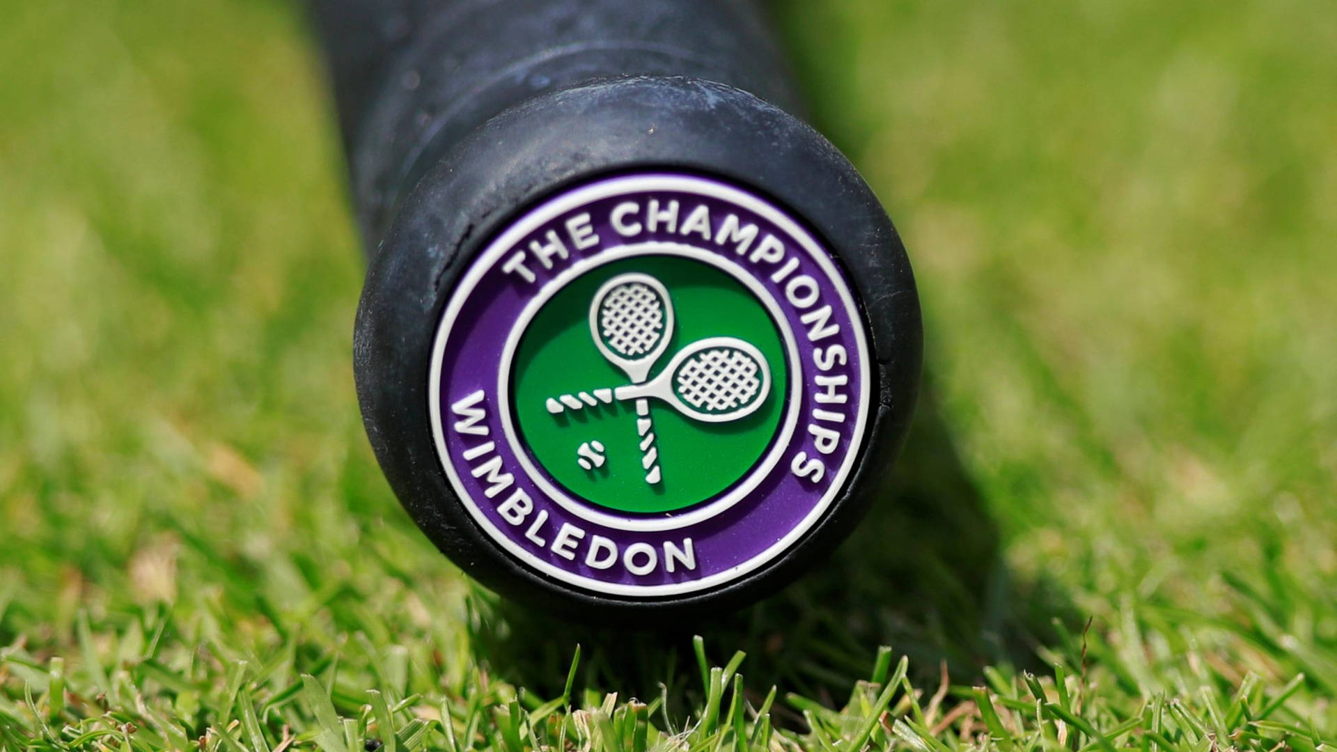 Wimbledon Rubberized Logo On Racket Background