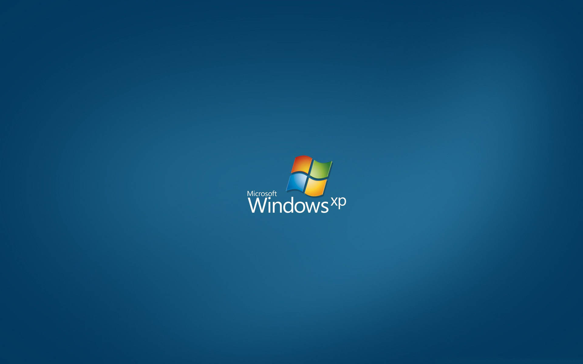 Windows Xp Logo On A Blue Background Background