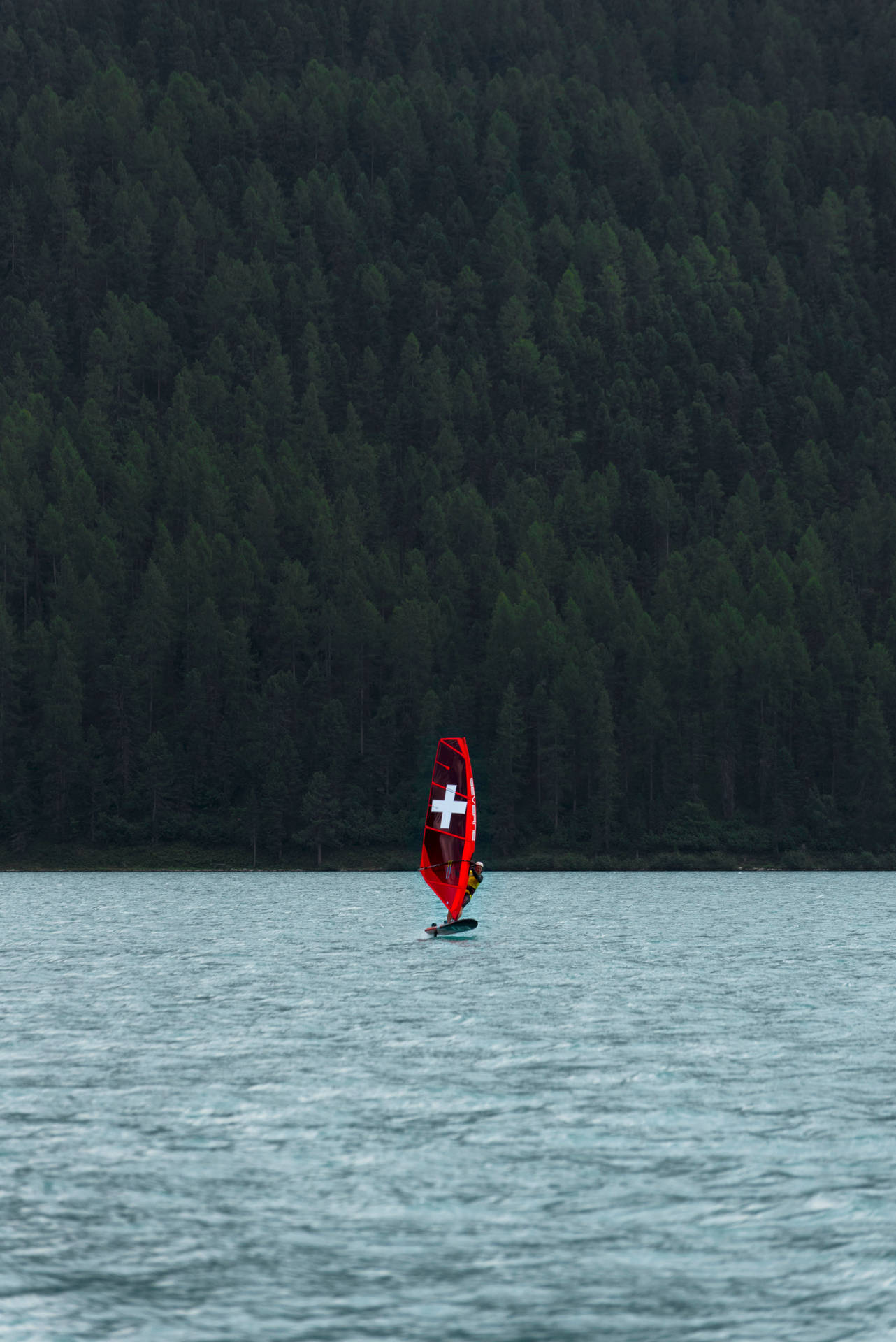 Windsurfing Sail With A Cross Background