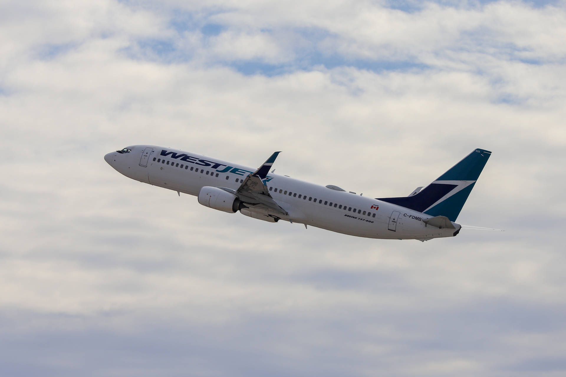 Winging Westjet Airplane Background