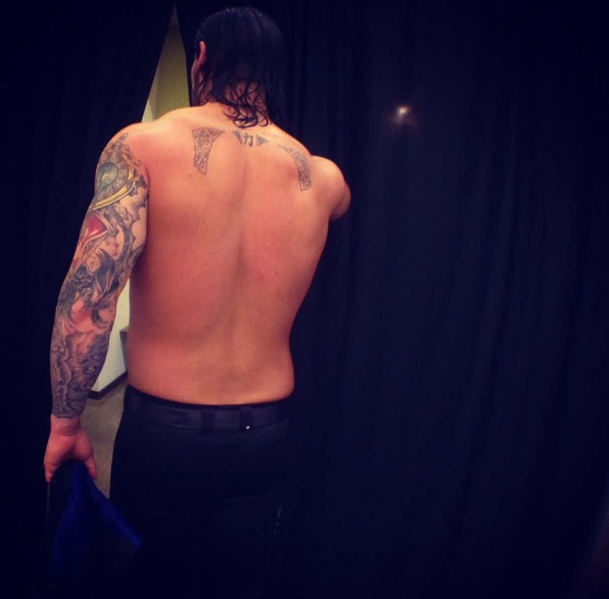 Wings Tattoo Of Wrestler Baron Corbin Background