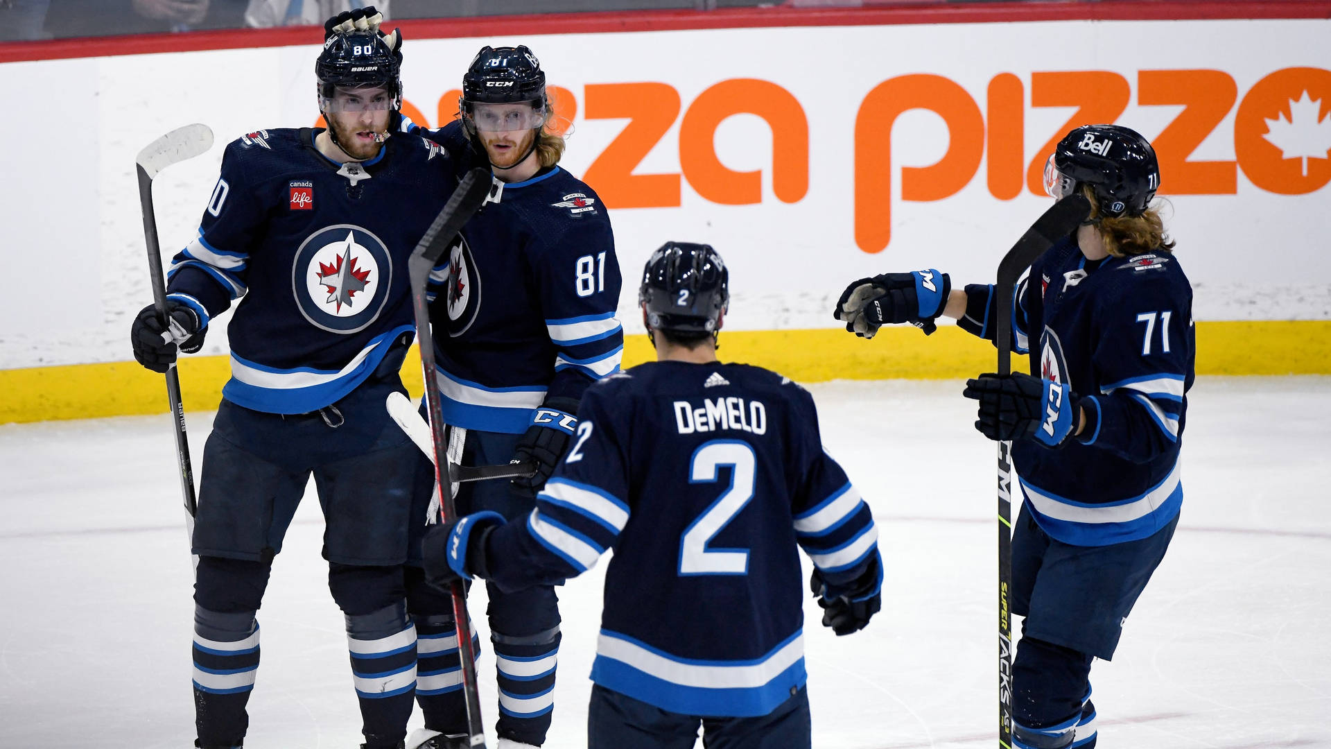 Winnipeg Jets Ice Hockey Players Kyle Connor And Teammates Background