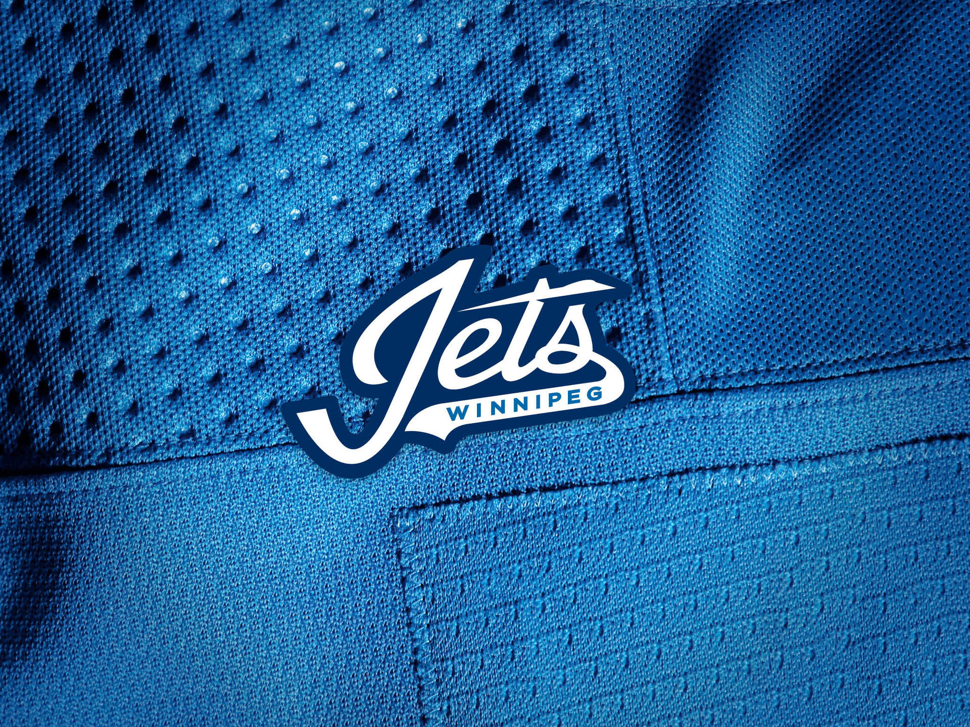 Winnipeg Jets Logo On Jersey Background
