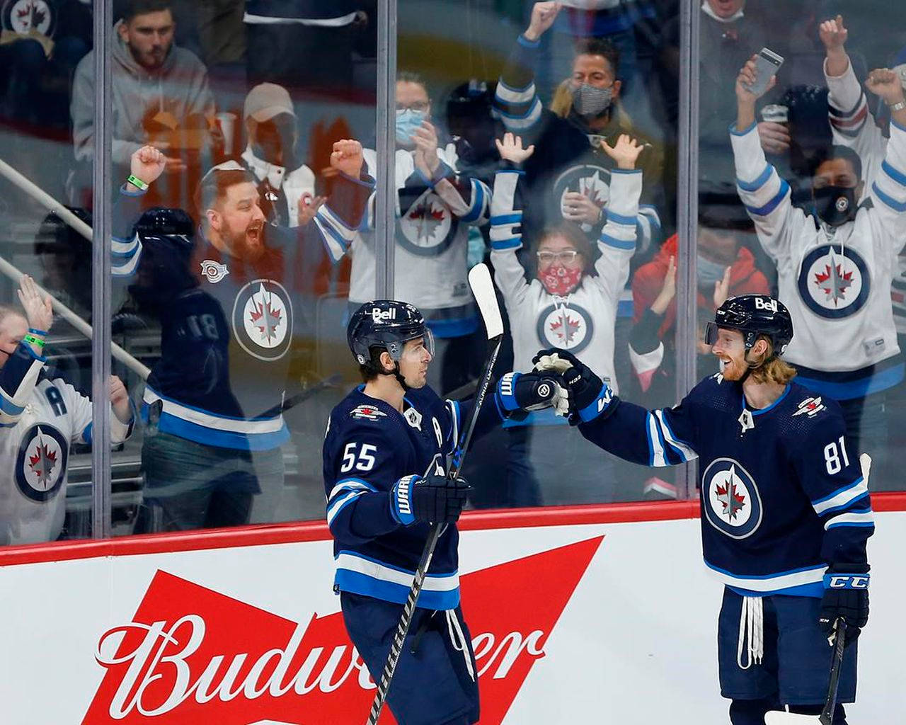 Winnipeg Jets Players Kyle Connor And Mark Scheifele Background