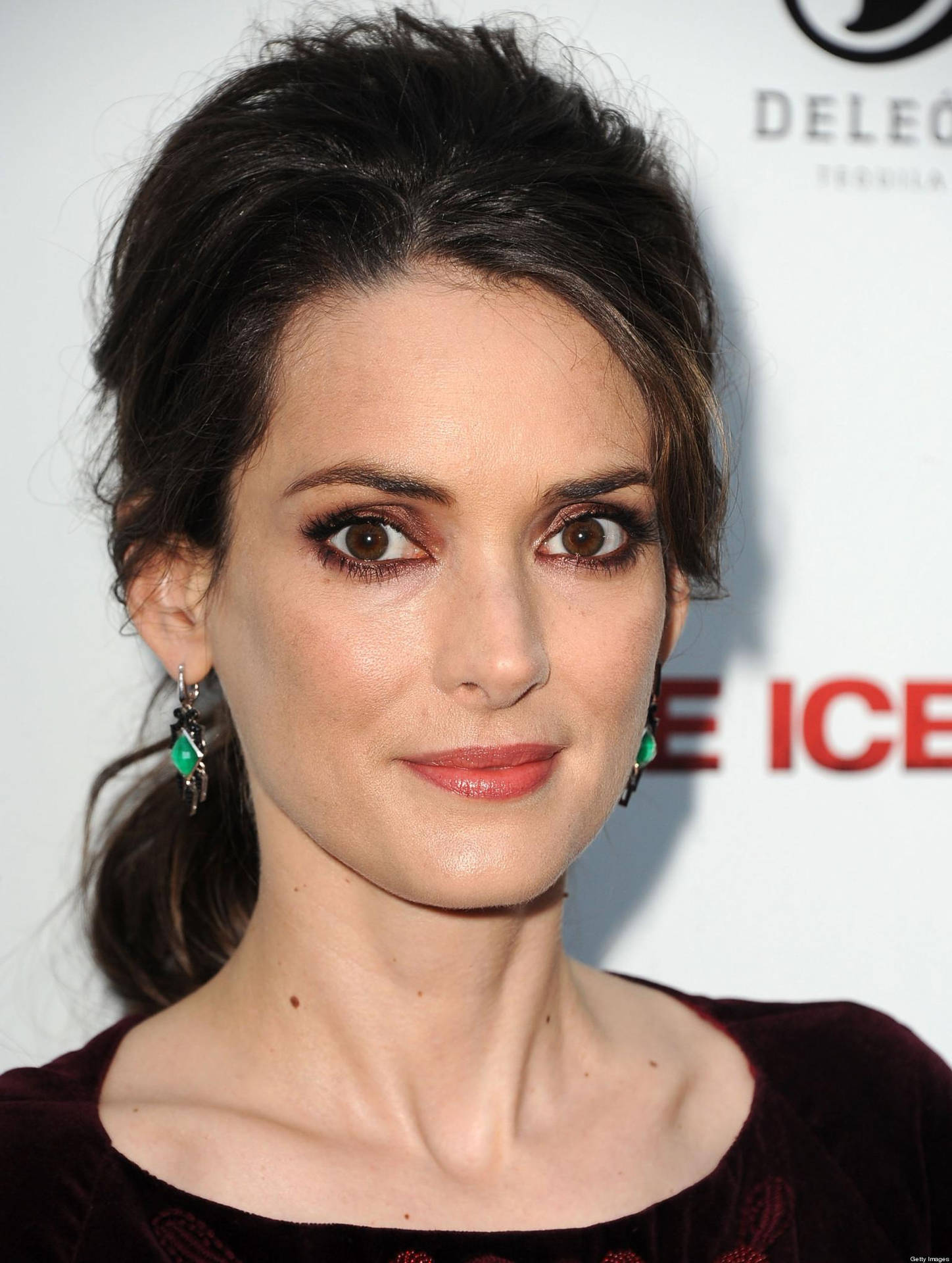 Winona Ryder In A Bouffant Ponytail Background