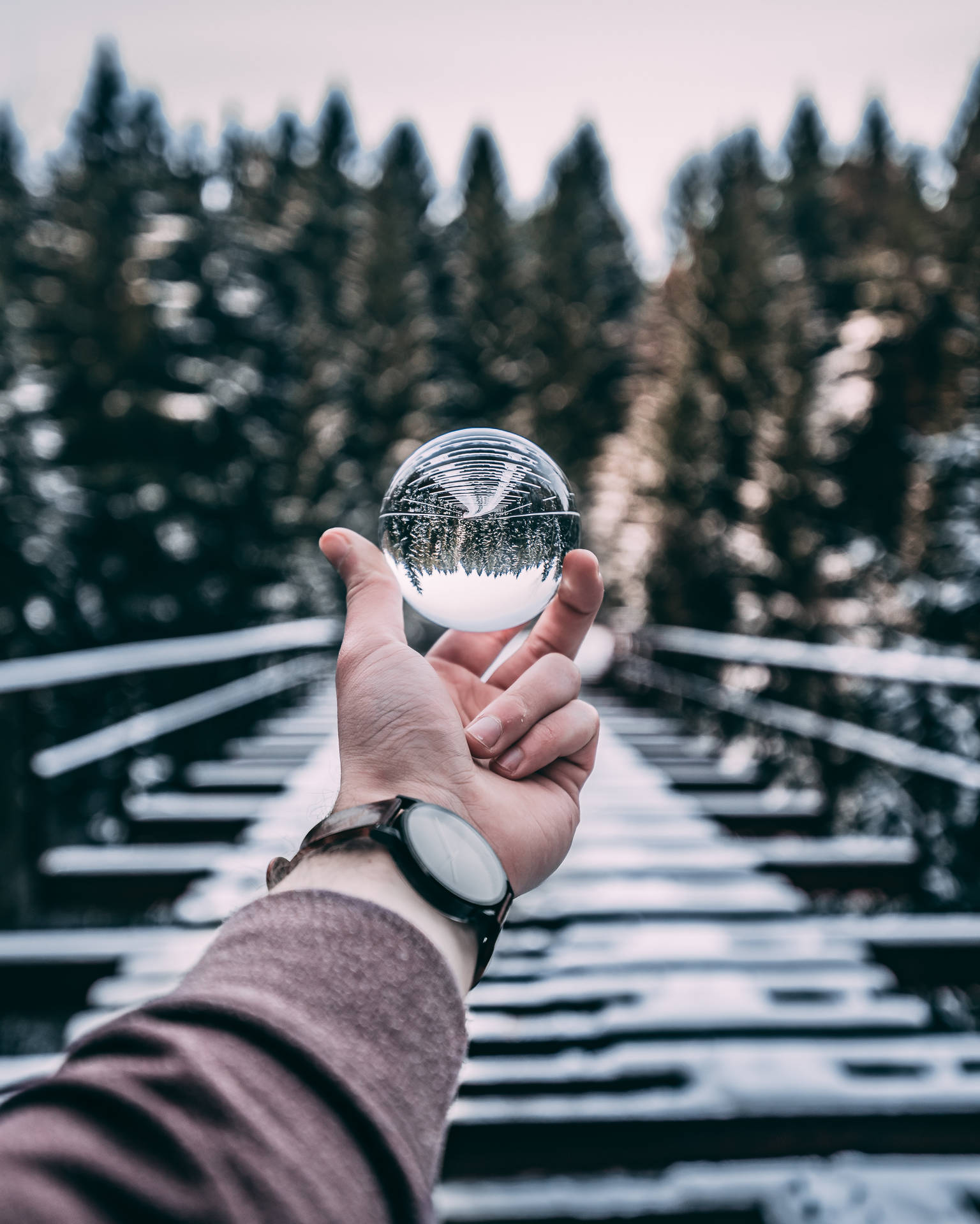 Winter Crystal Ball In Hand Background