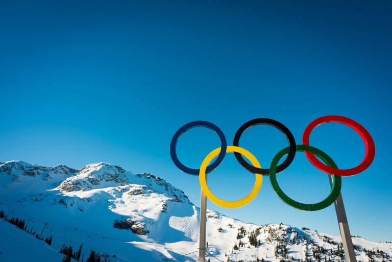 Winter Olympics Logo In Snow Background