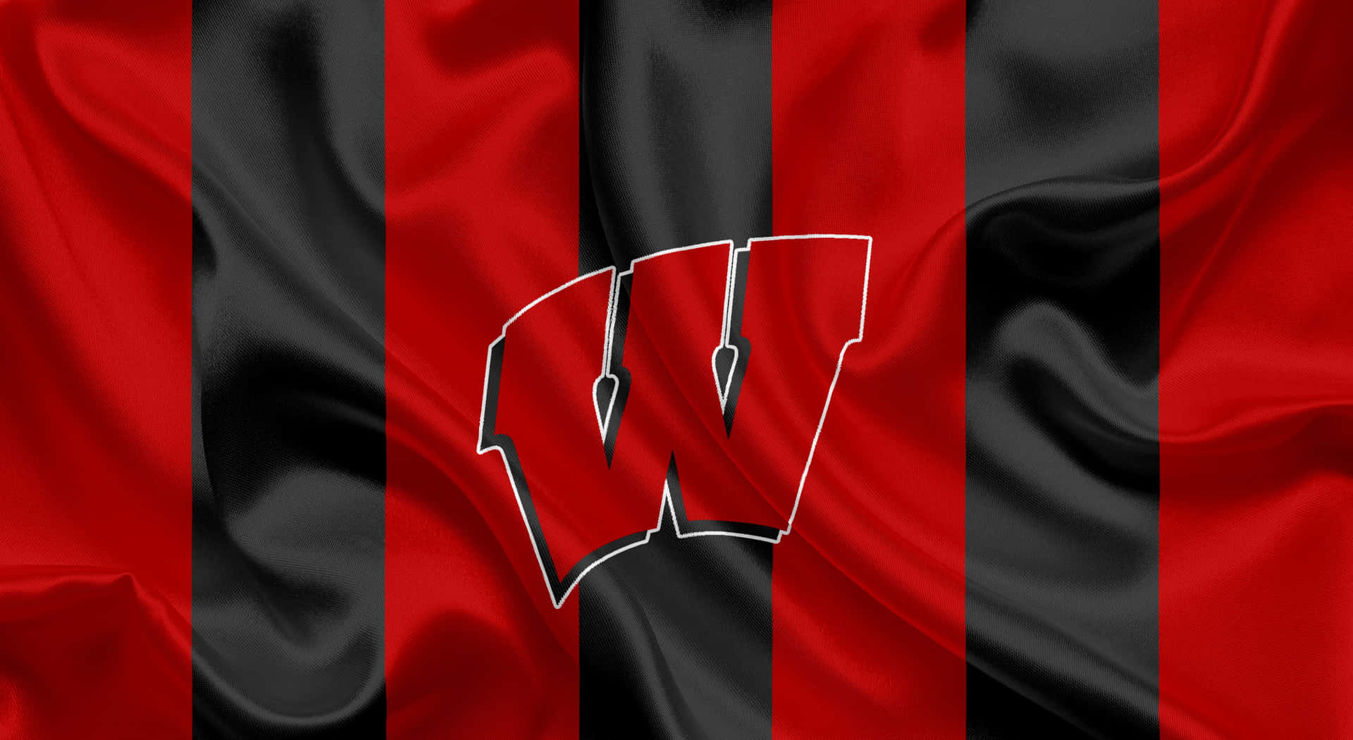 Wisconsin Badgers Football Team Celebrating A Victory Background
