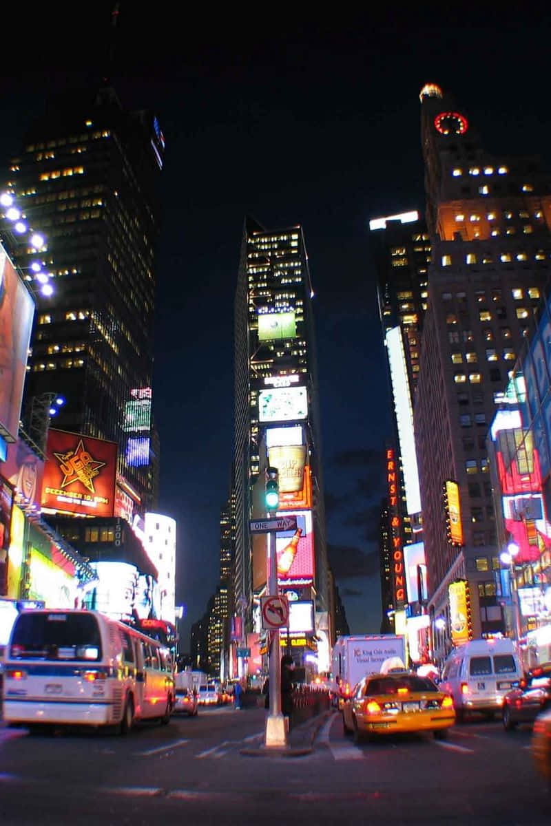 Witness The Beauty Of The New York City Skyline At Night Background