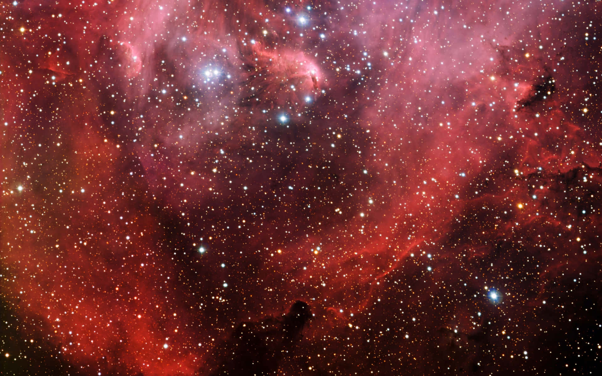 Witness The Breathtaking Beauty Of An Outer Space Fog Illuminated By A Deep Red Hue