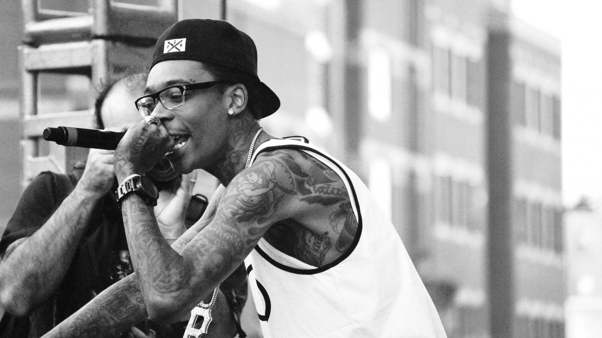 Wiz Khalifa Black And White Rapping Background