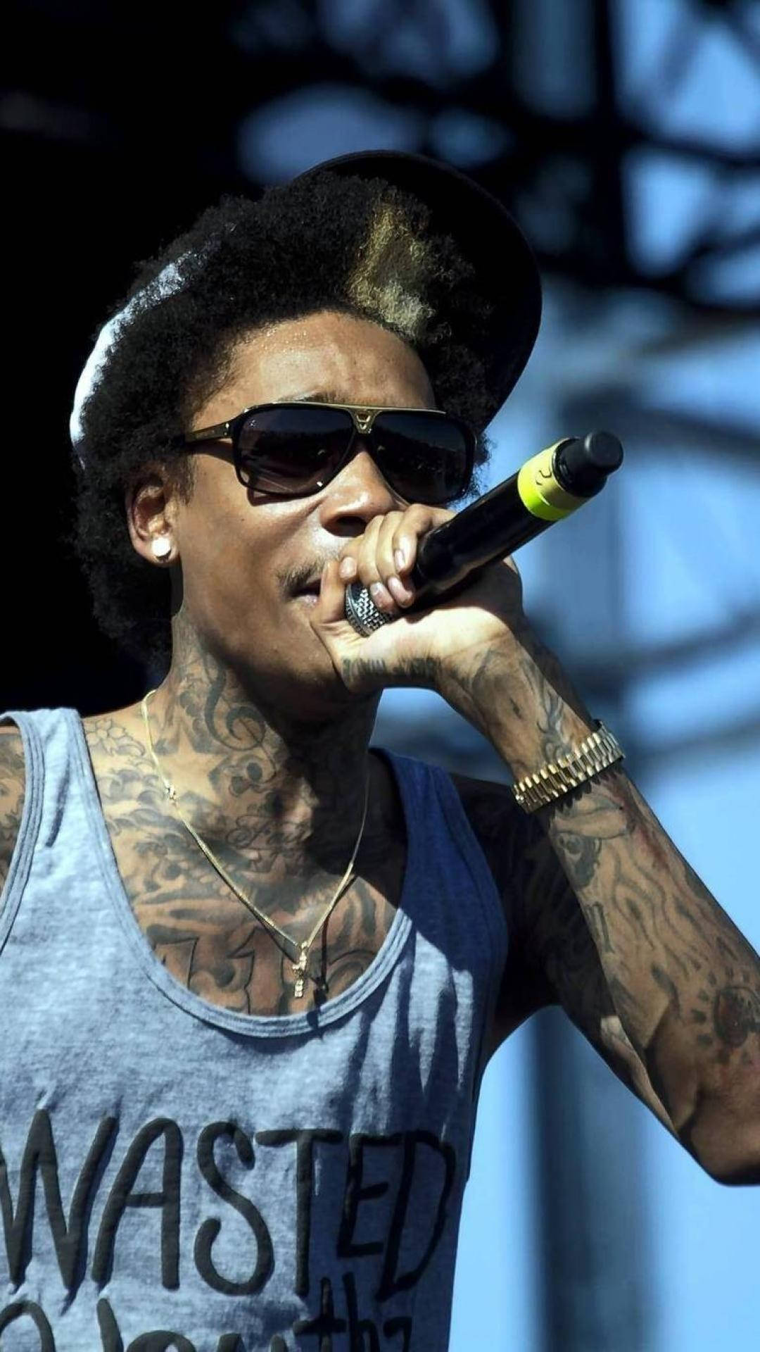 Wiz Khalifa On Stage Background