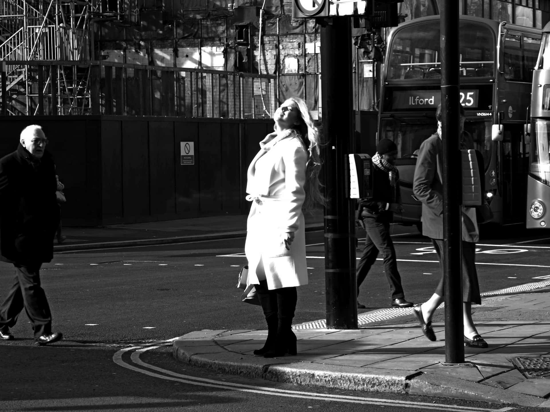 Woman Amid Random People Crossing A City Street