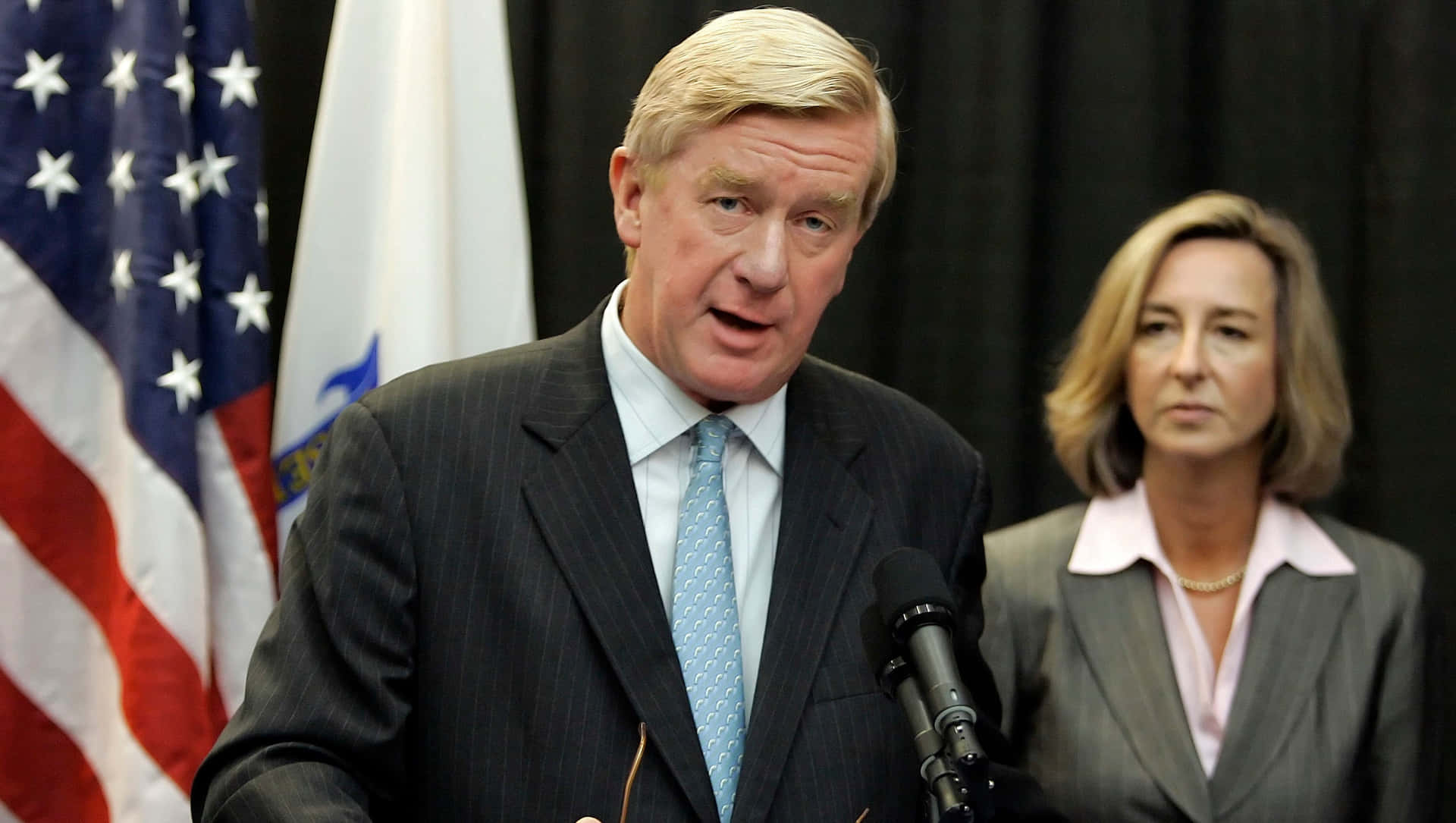Woman Attentively Listening To William Weld