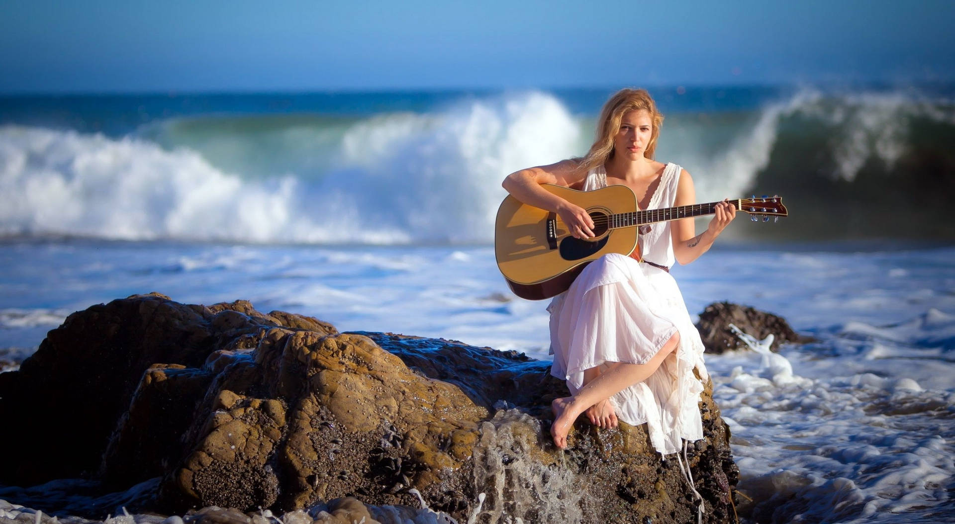 Woman Beach Playing Guitar Background