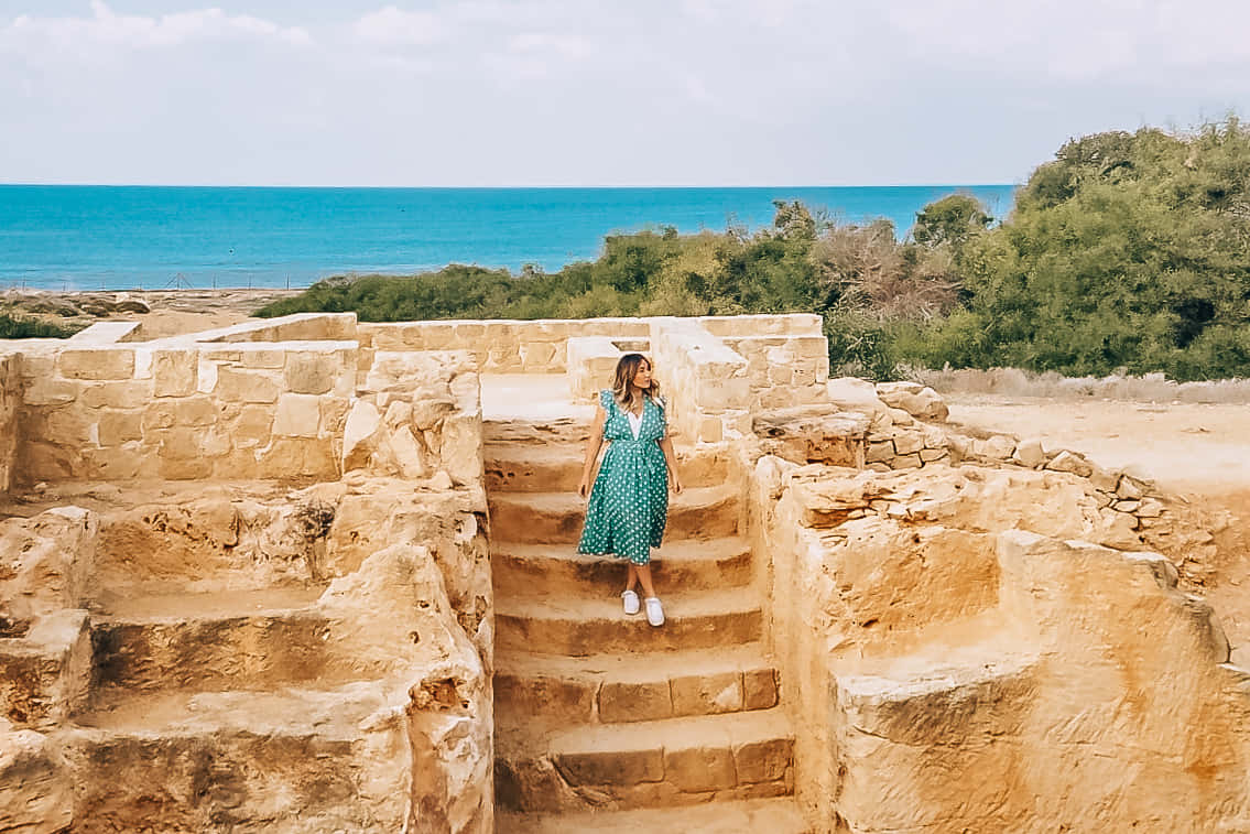 Woman Captured In Archaeological Site Of Nea Paphos Background