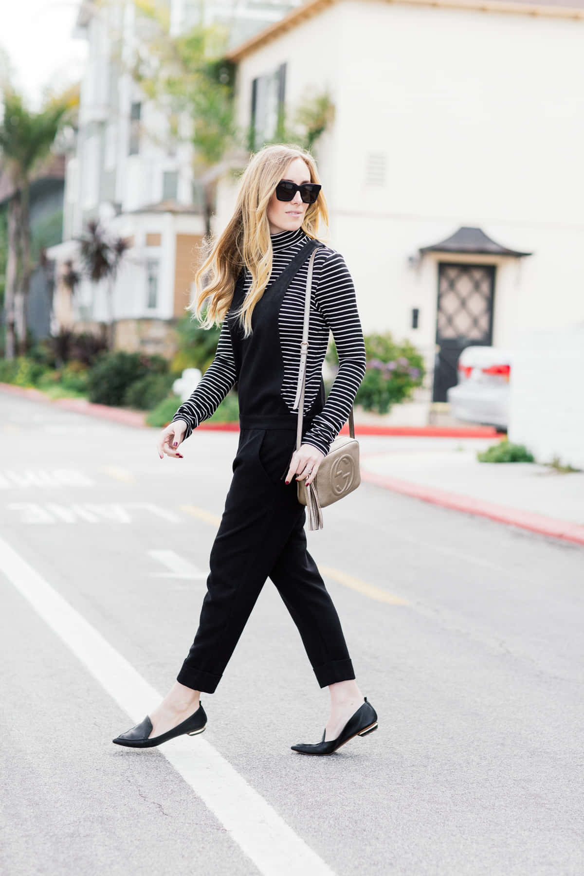 Woman Crossing Street With Nicholas Kirkwood Loafers Background