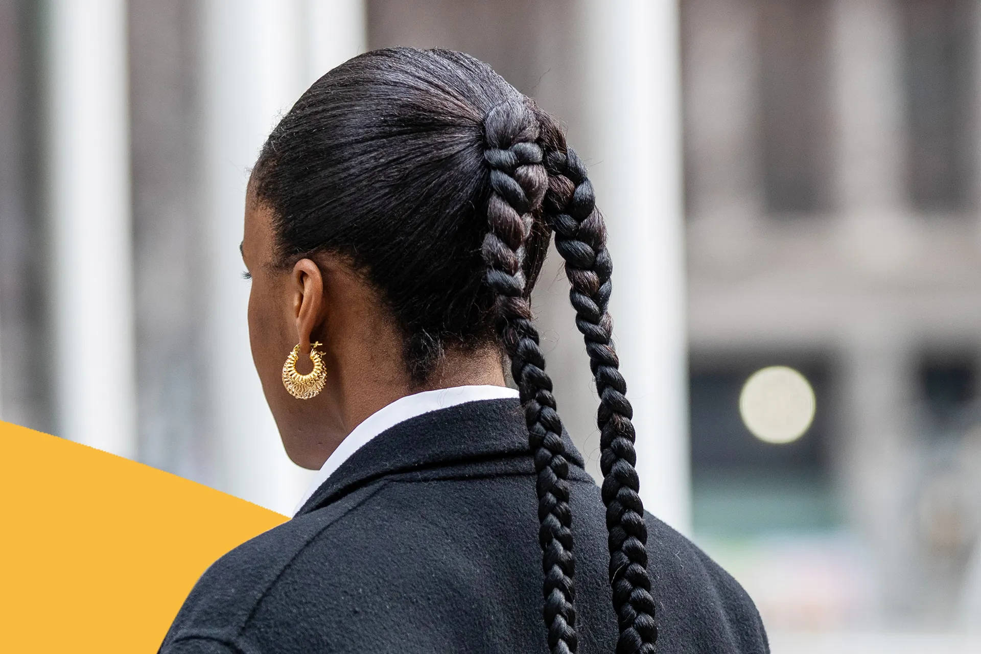 Woman Empowerment In Corporate Fashion - Boss Lady In A Suit With Stylish Braids Background