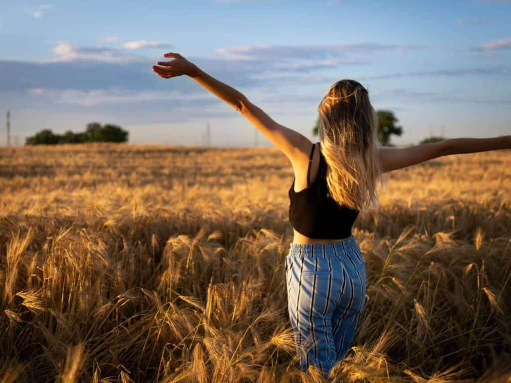 Woman Enjoying Life In Wheat Field