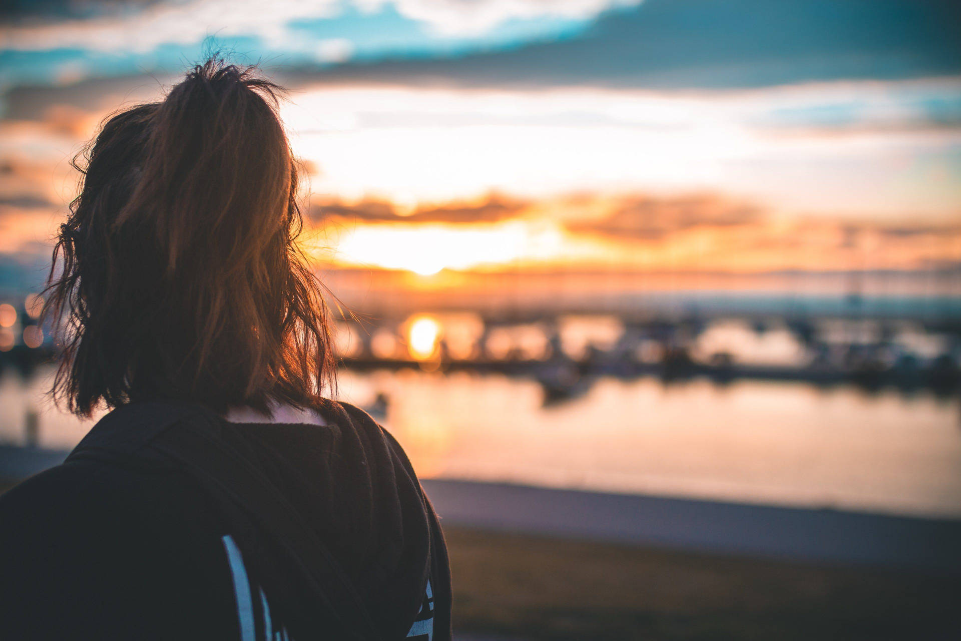 Woman Enjoying Serene Beach Sunset