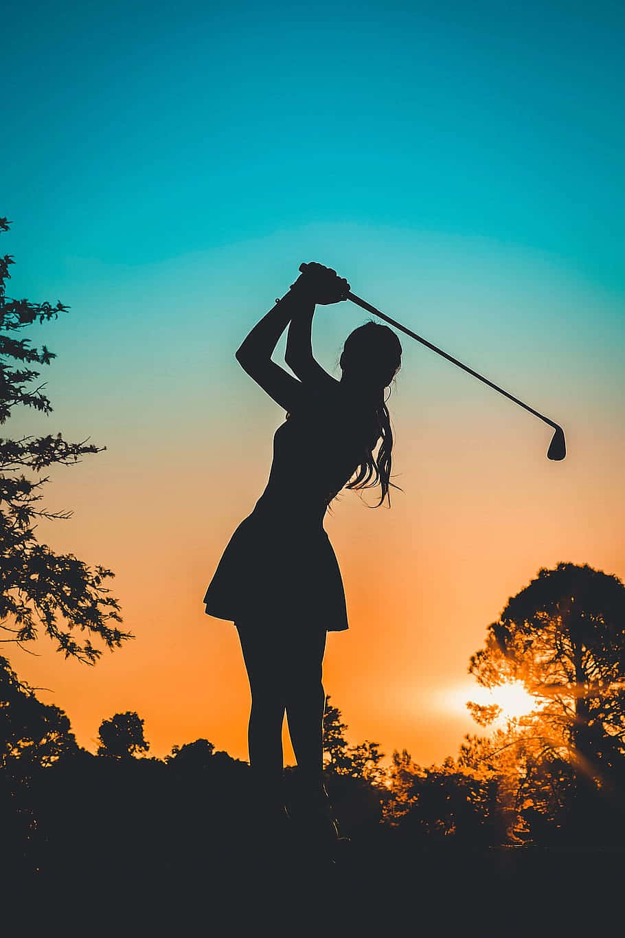 Woman Golfing Silhouette Background