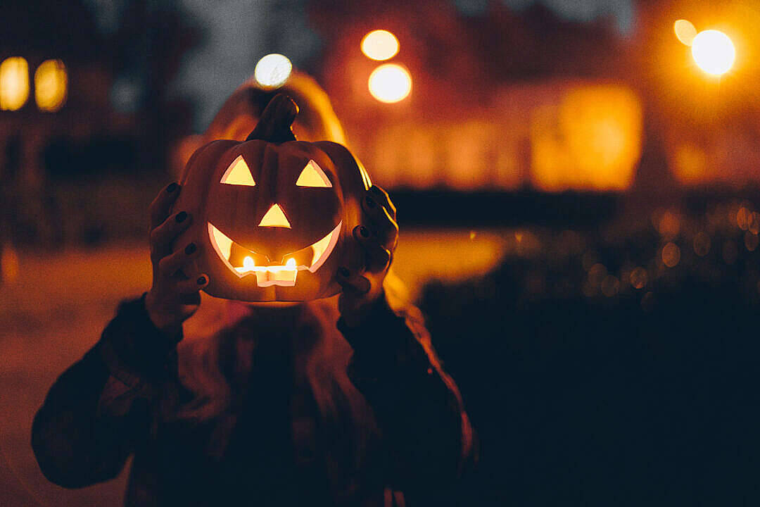 Woman Holding A Pumpkin Halloween Computer Background