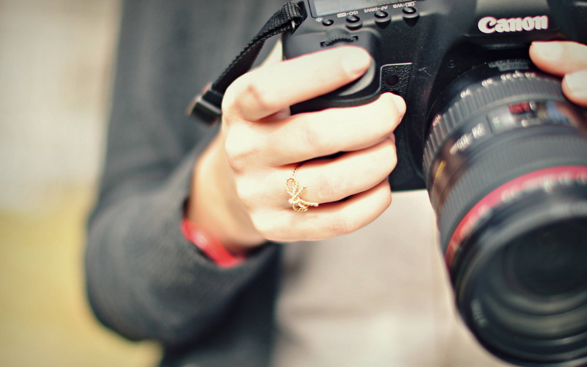 Woman Holding Canon Dslr Camera Products