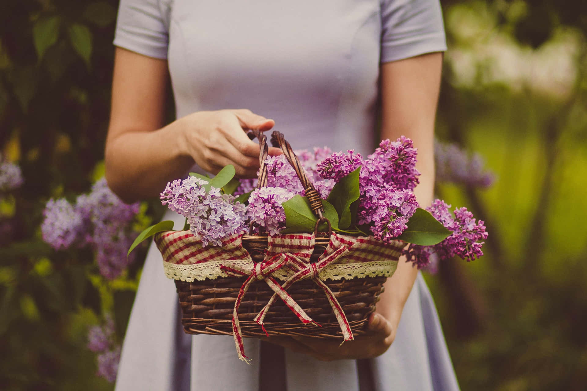 Woman Holding Flower Basket