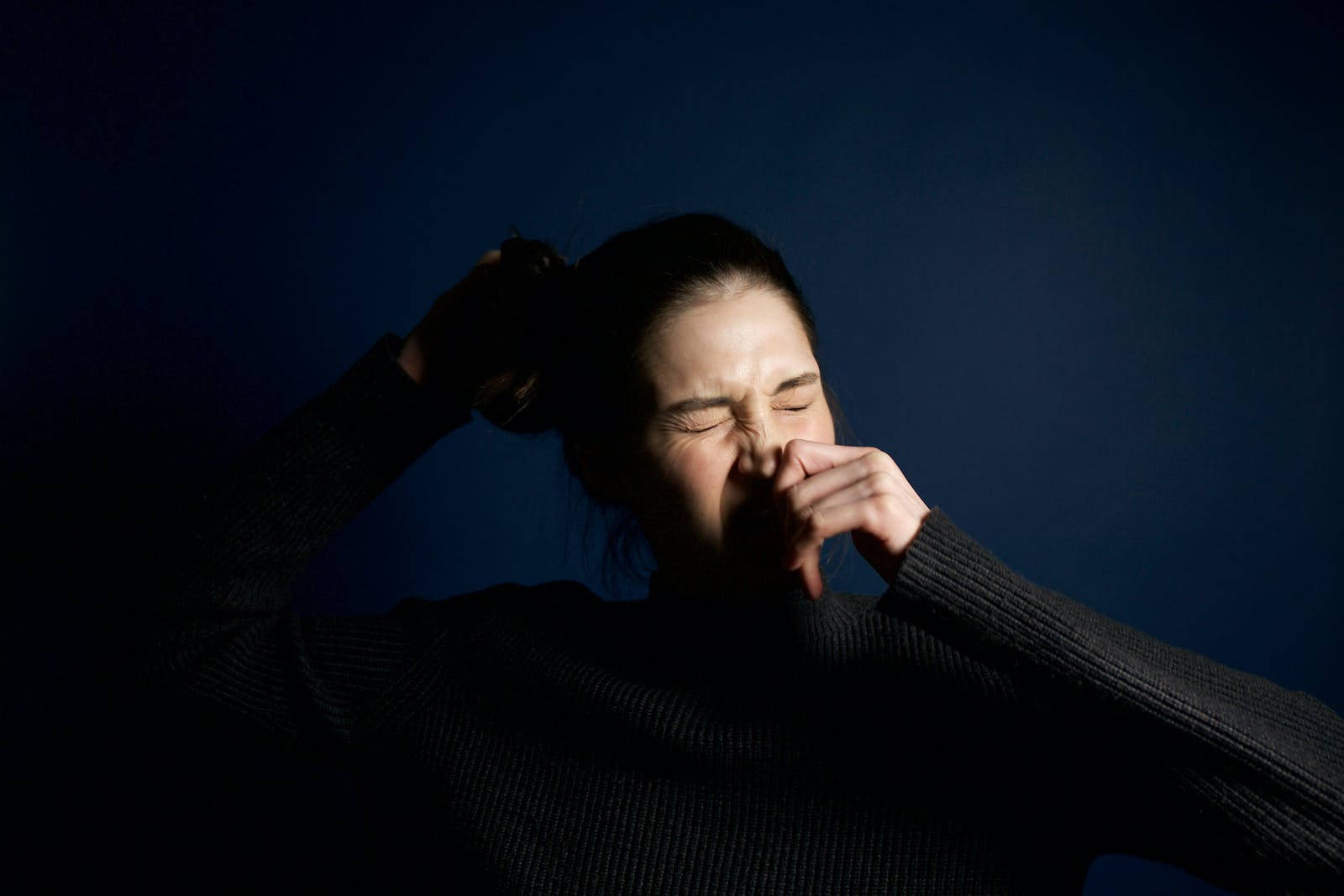 Woman Holding Sneeze Background