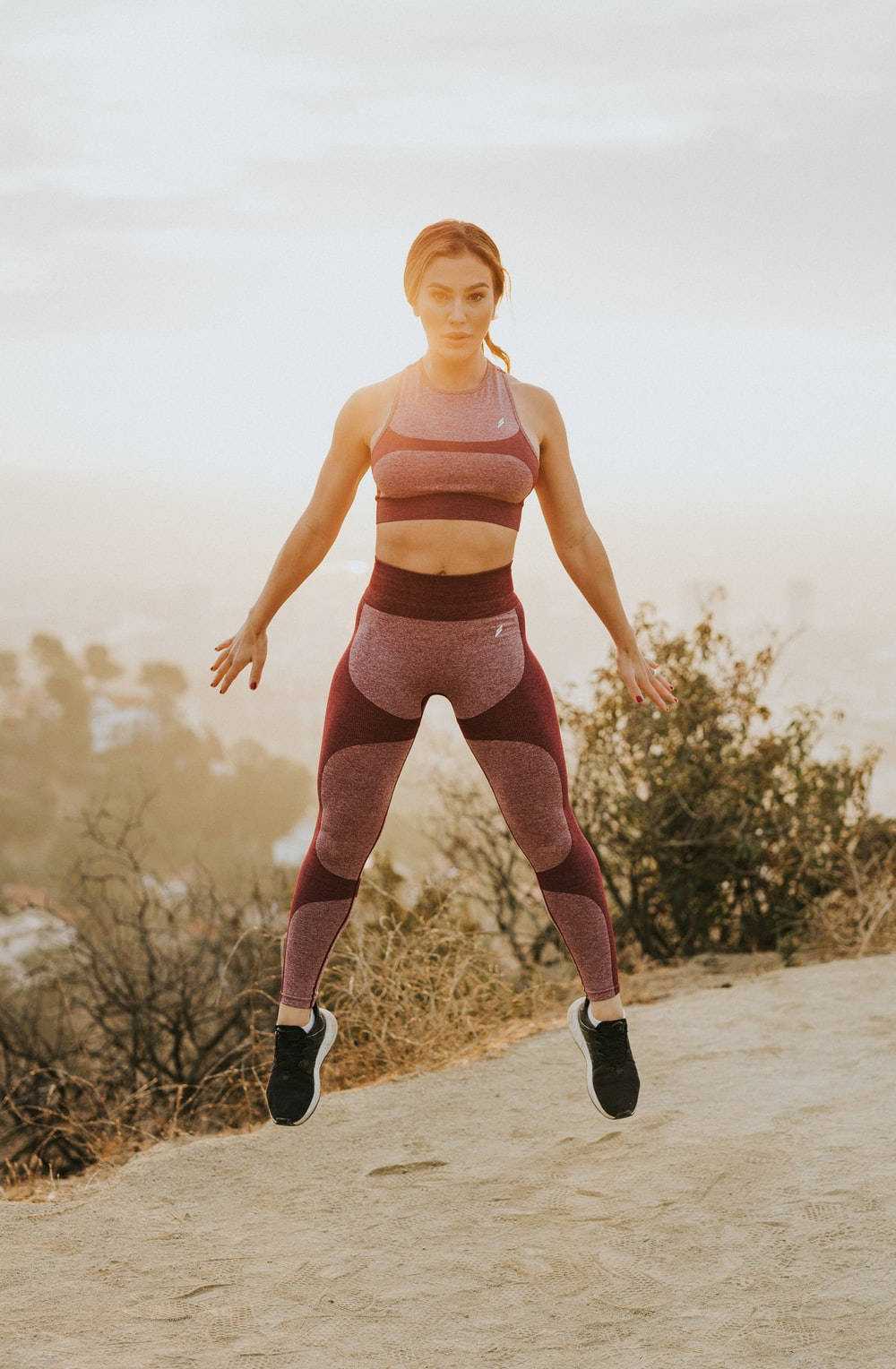 Woman In Athletic Wear Outdoors Background