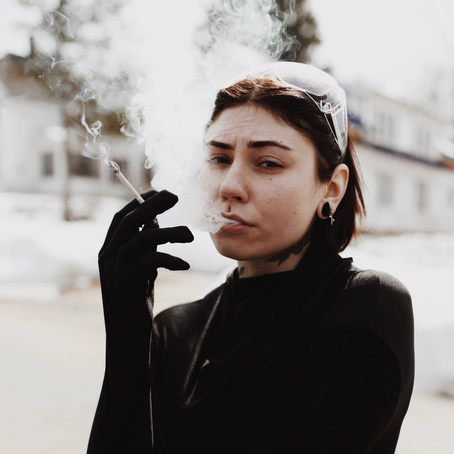 Woman In Black Smoking Background