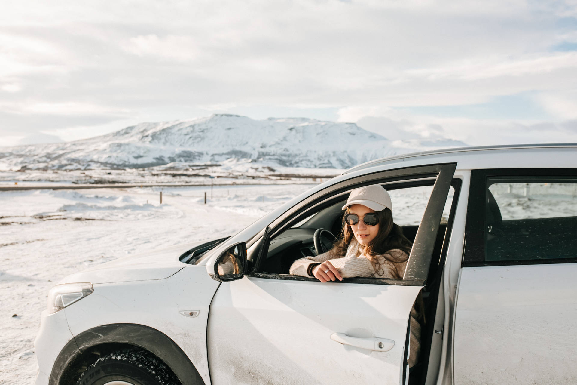 Woman In Car During Cool Winter Background
