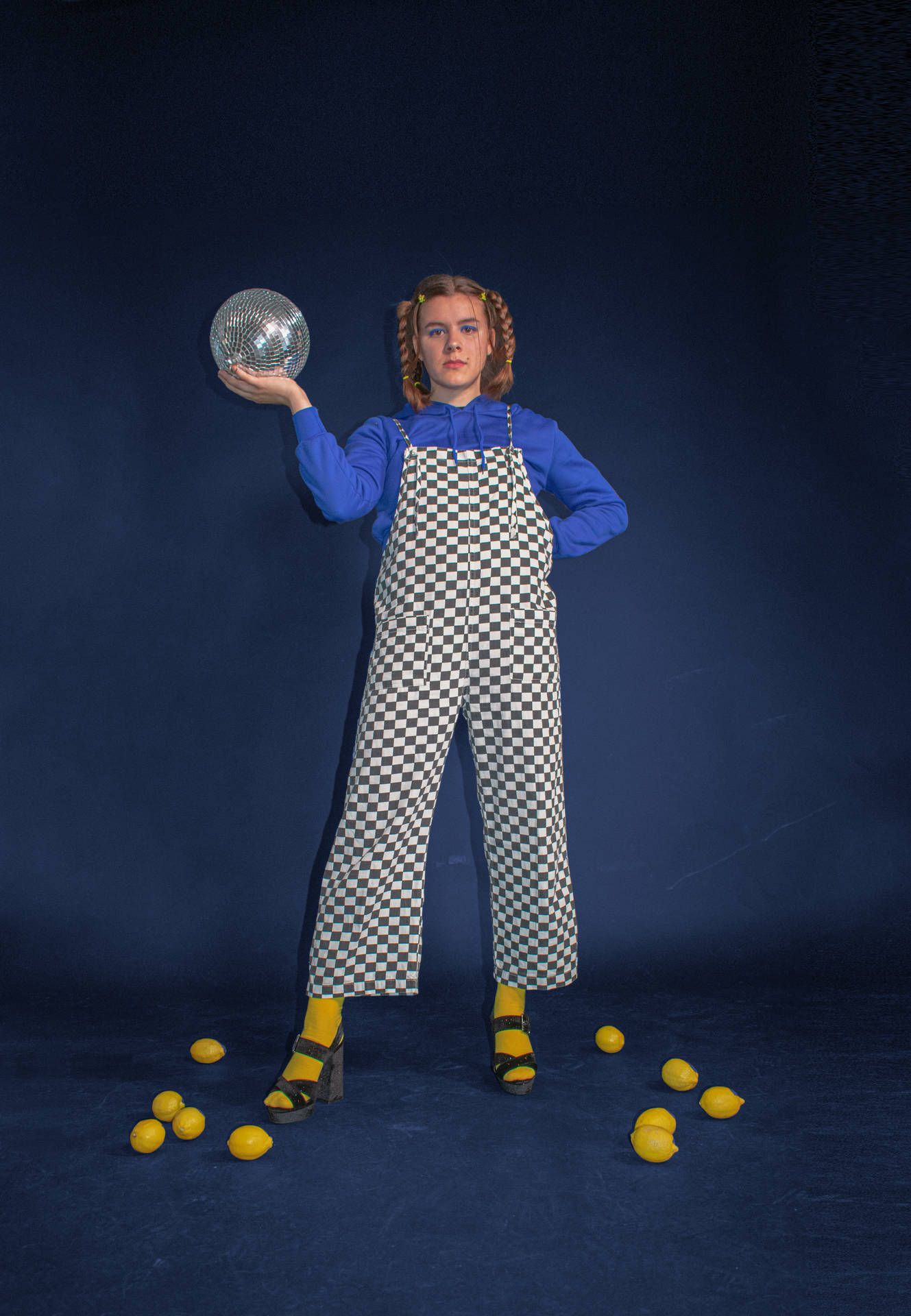 Woman In Checkered Jumpsuit Background