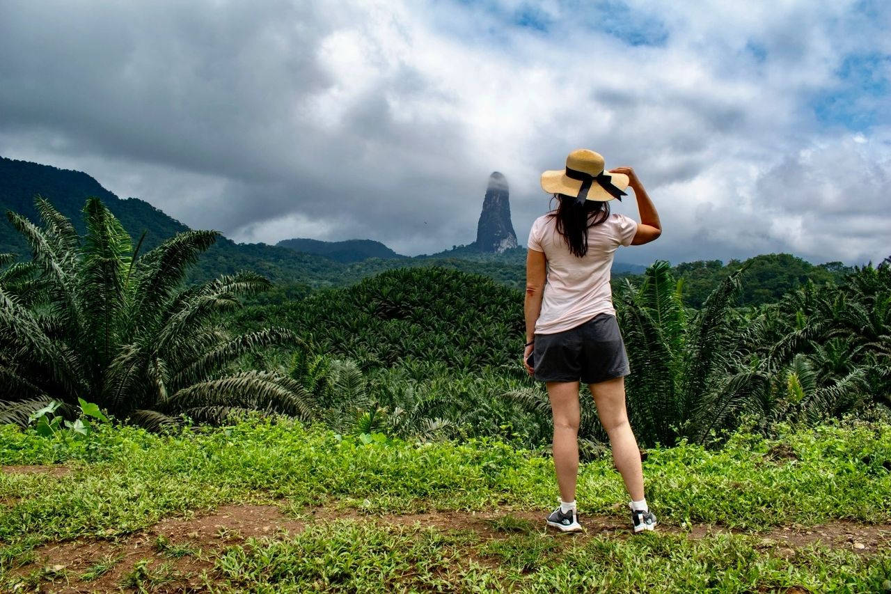 Woman In Sao Tome And Principe Forest Background