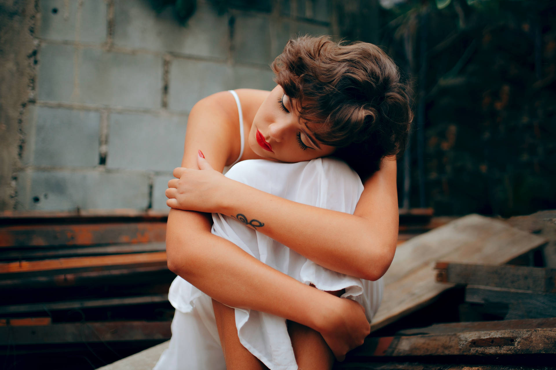 Woman In White Dress Sitting Alone Background