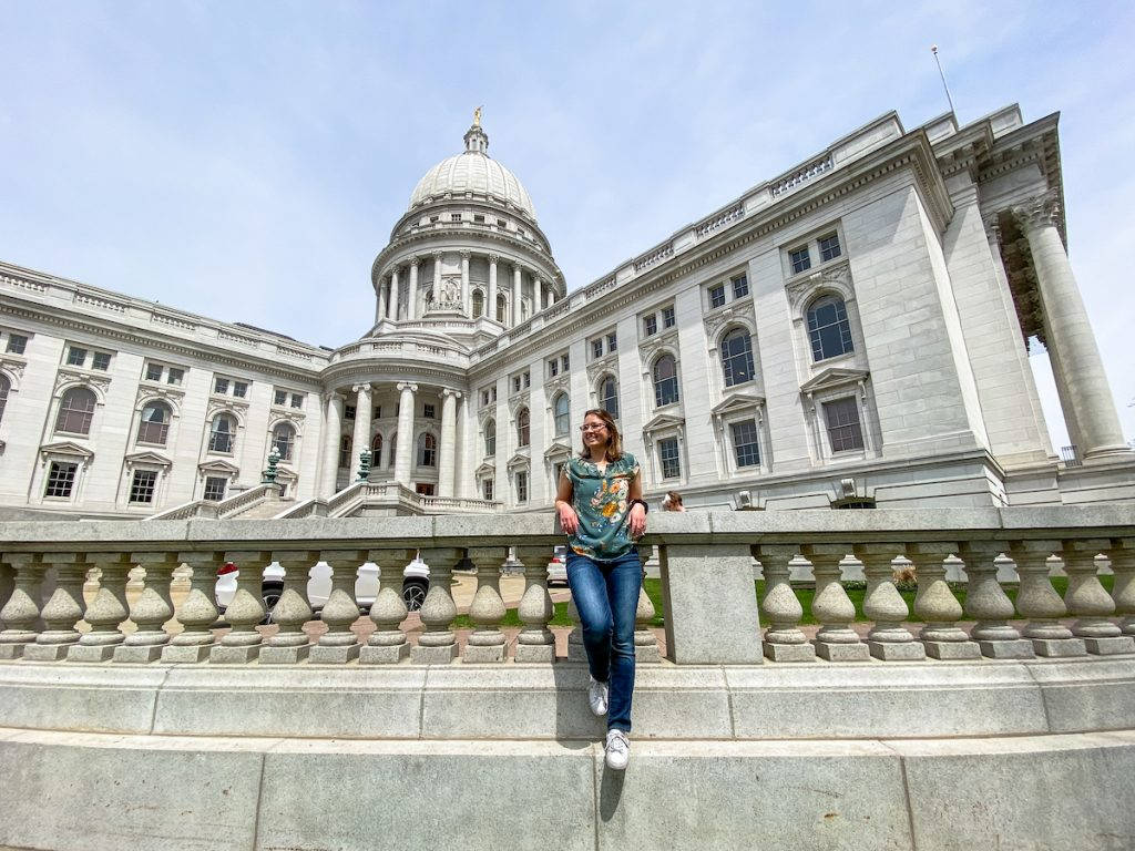 Woman In Wisconsin State Capitol, Madison Background
