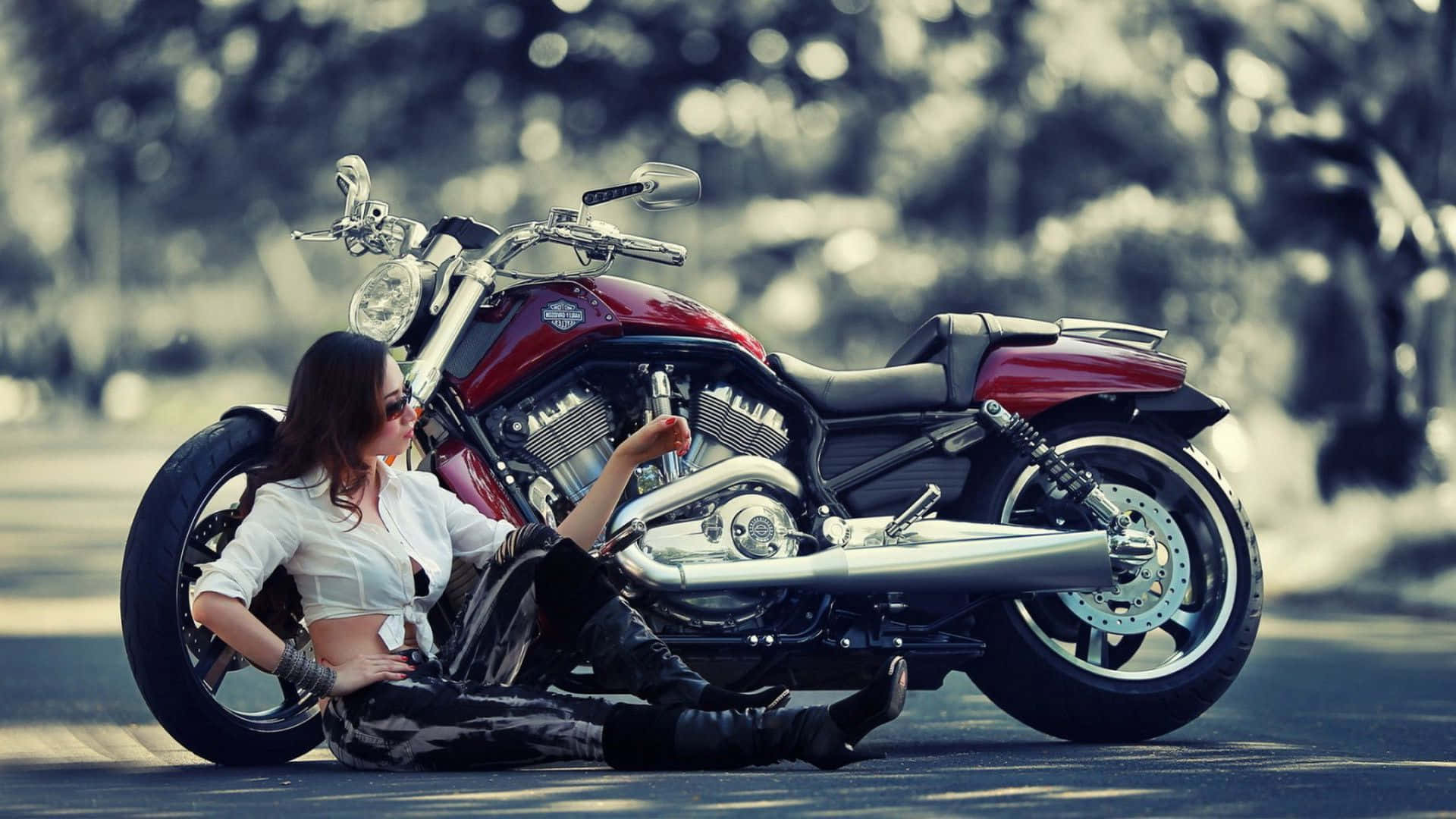 Woman Leaningon Classic Motorcycle Outdoors