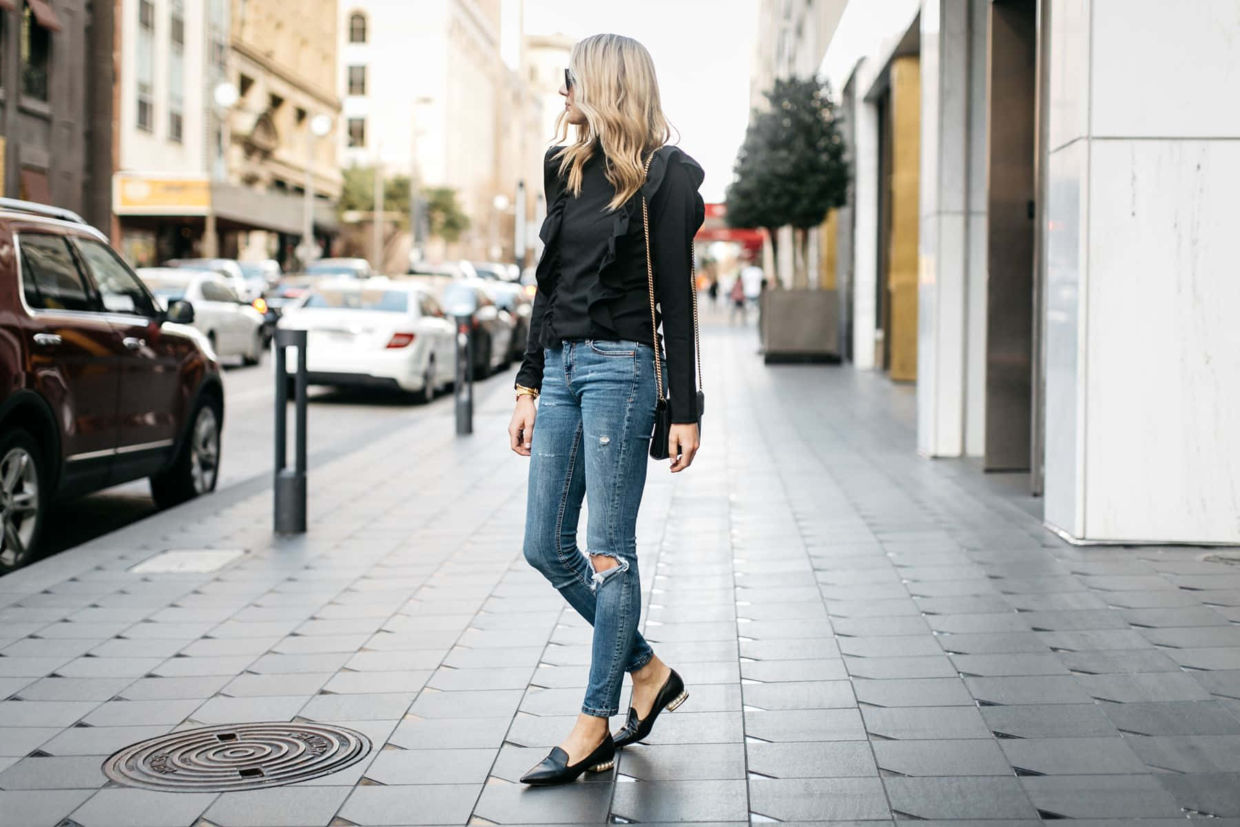 Woman On Sidewalk With Nicholas Kirkwood Shoes Background