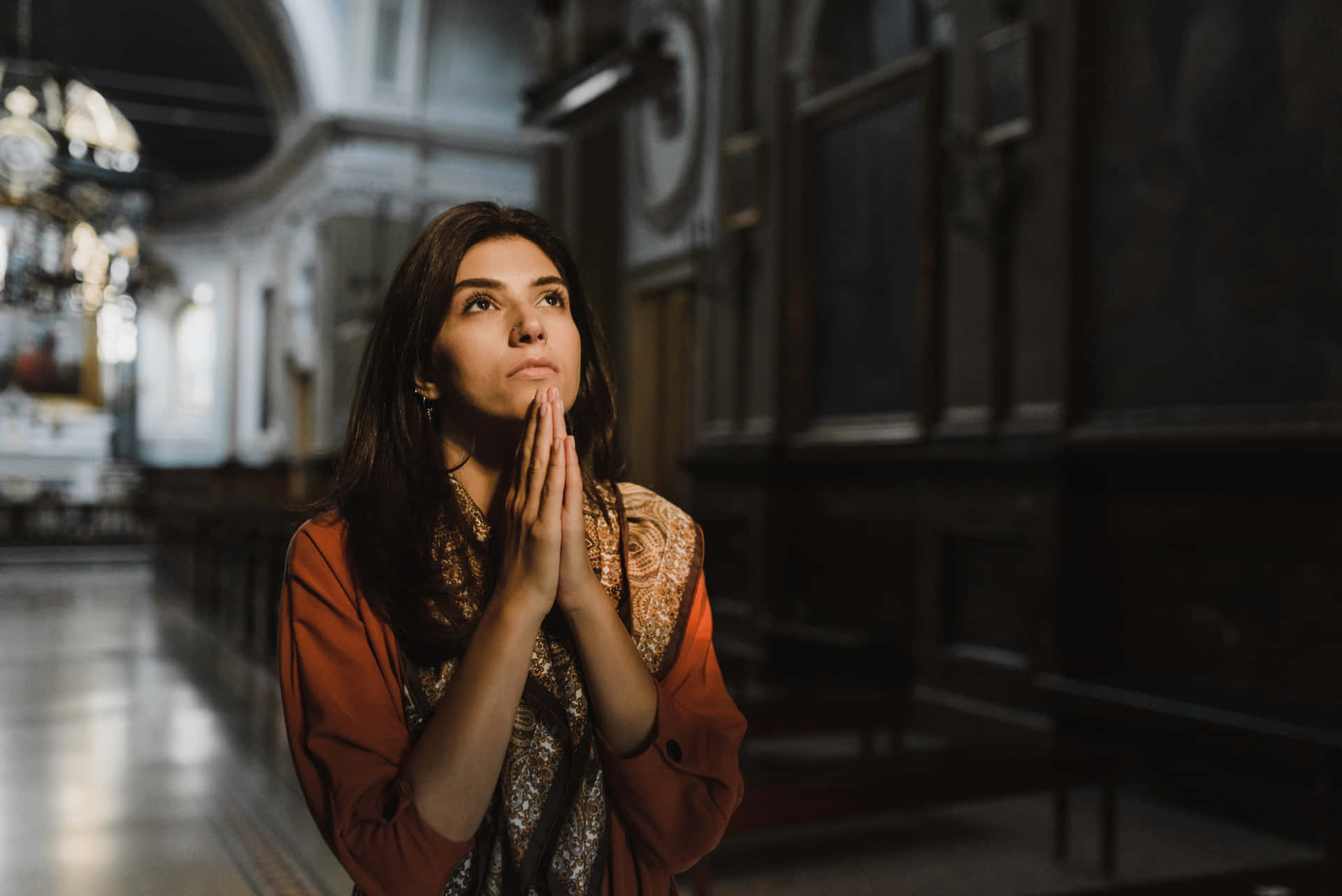 Woman Praying At The Church