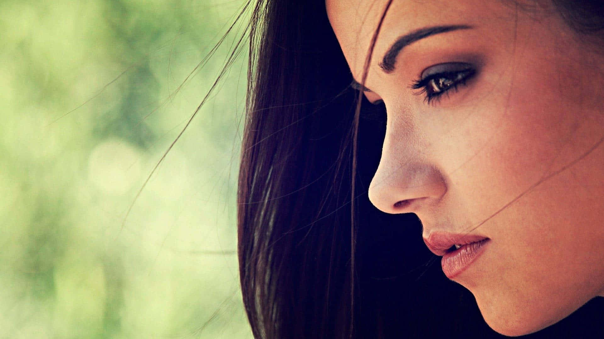 Woman Profile With Arched Brows Background