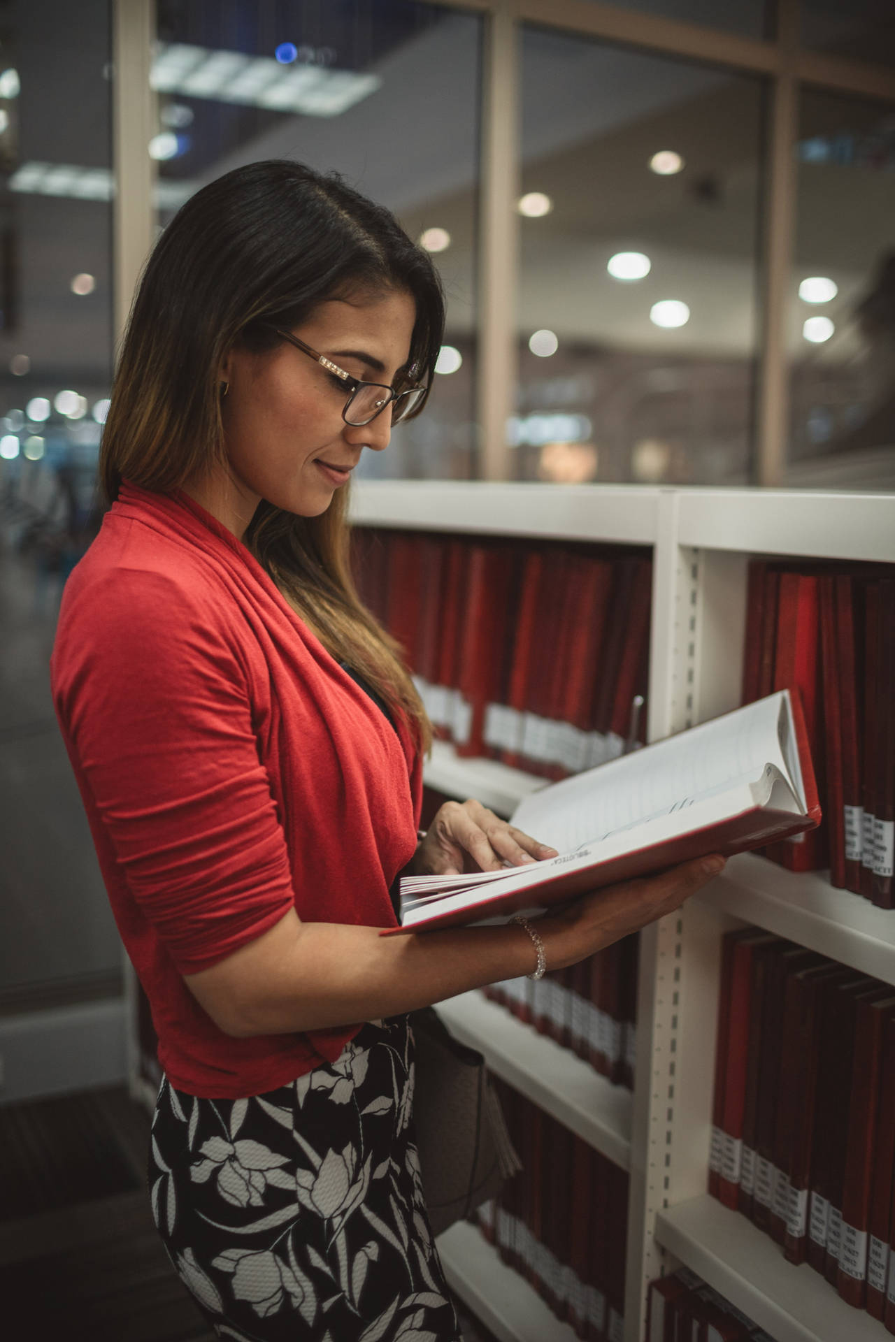 Woman Reading A Reference Book Background