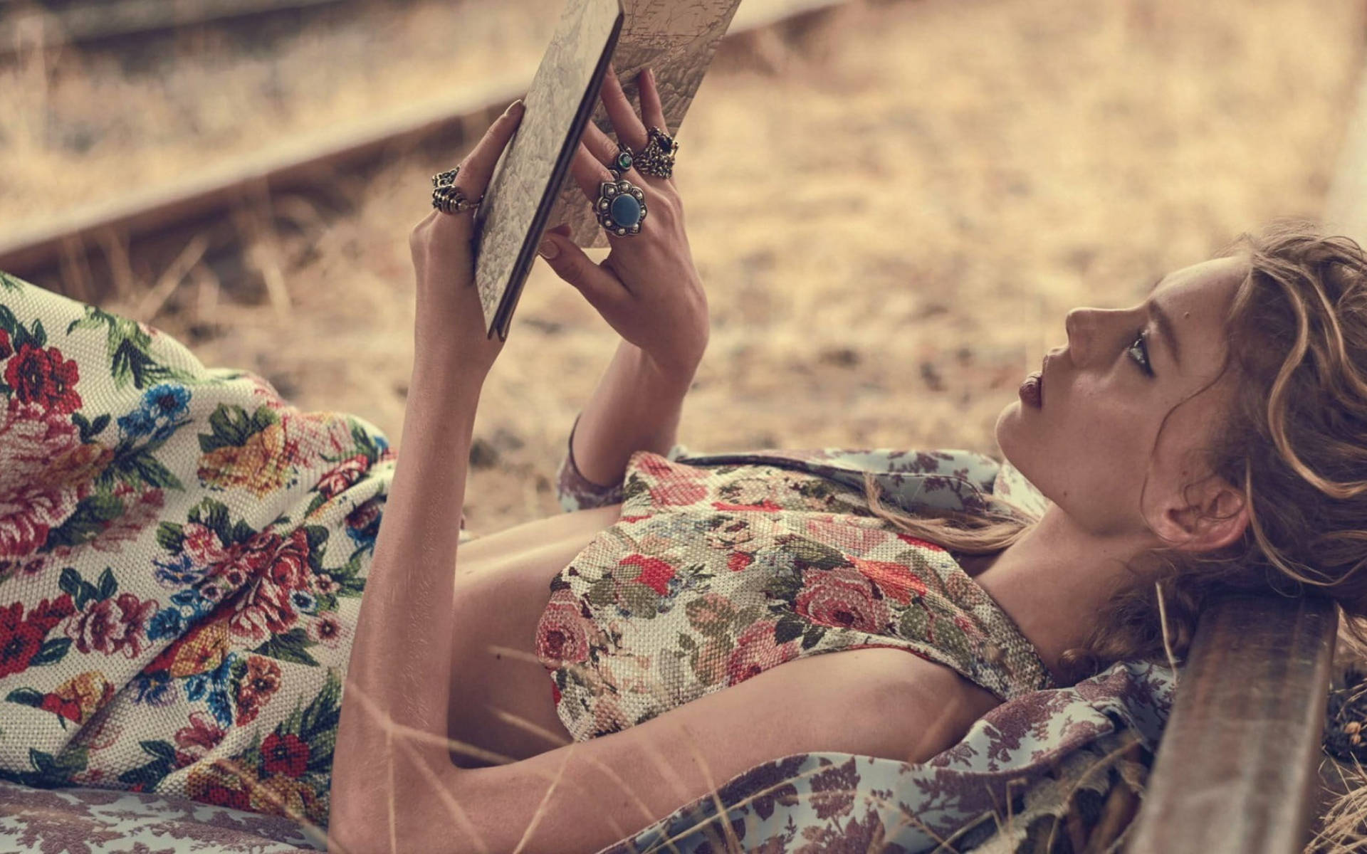 Woman Reading In Train Railway Background