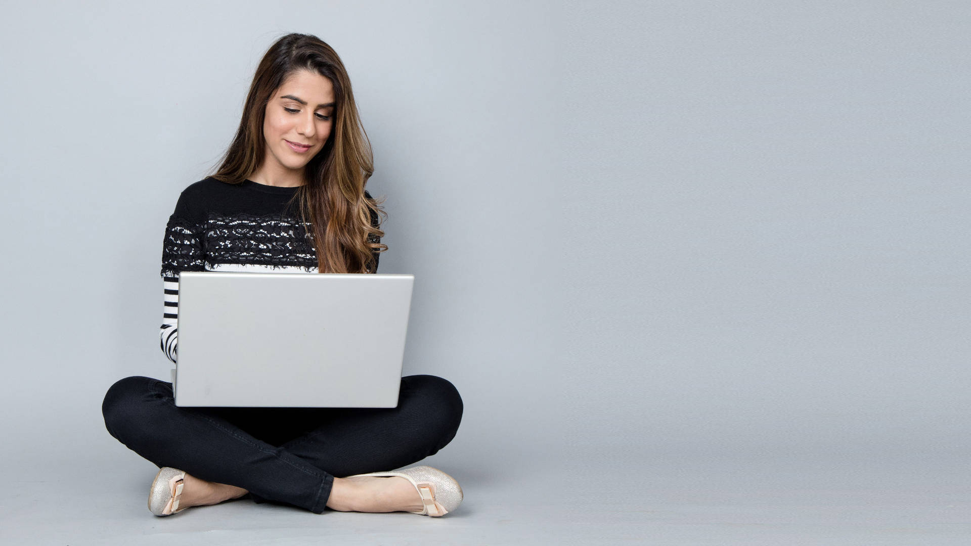 Woman Reading On Laptop Background