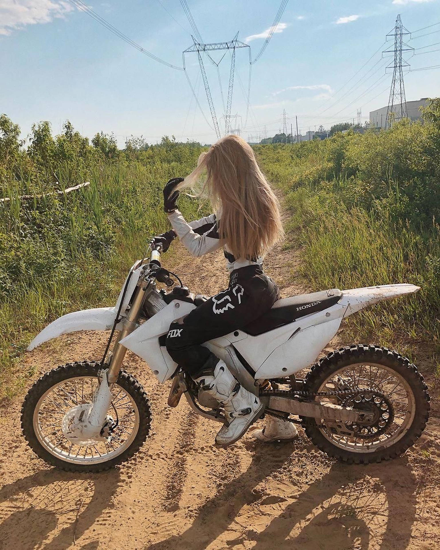 Woman Riding Dirt Bike Background