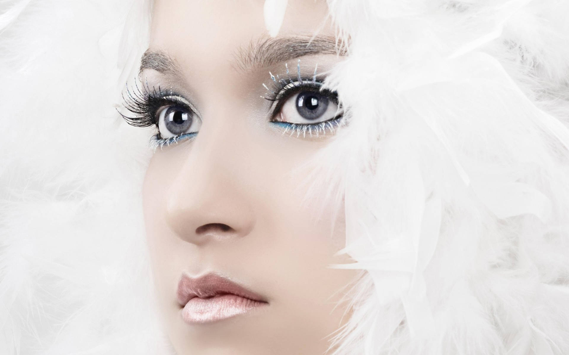 Woman's Face With White Feathers Background