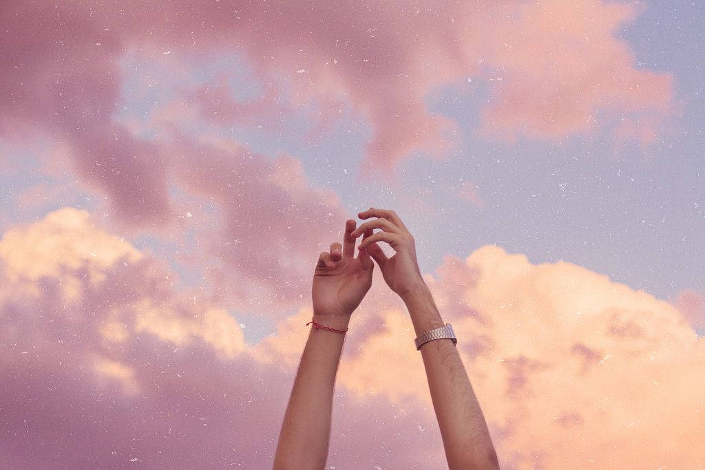 Woman's Hands Under Pink Sky Pfp Aesthetic