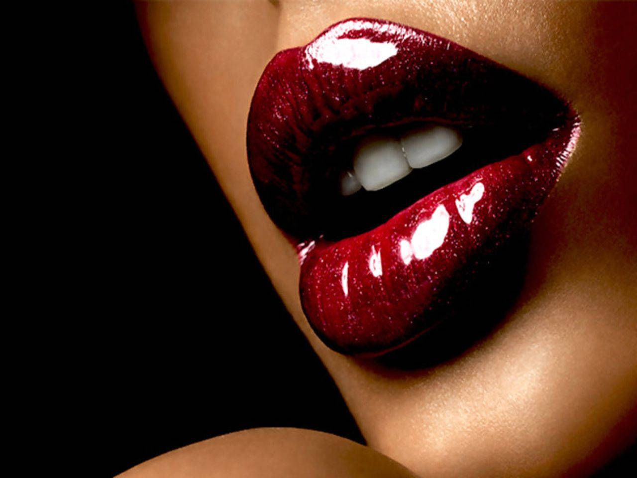 Woman's Red Glittering Lips Background